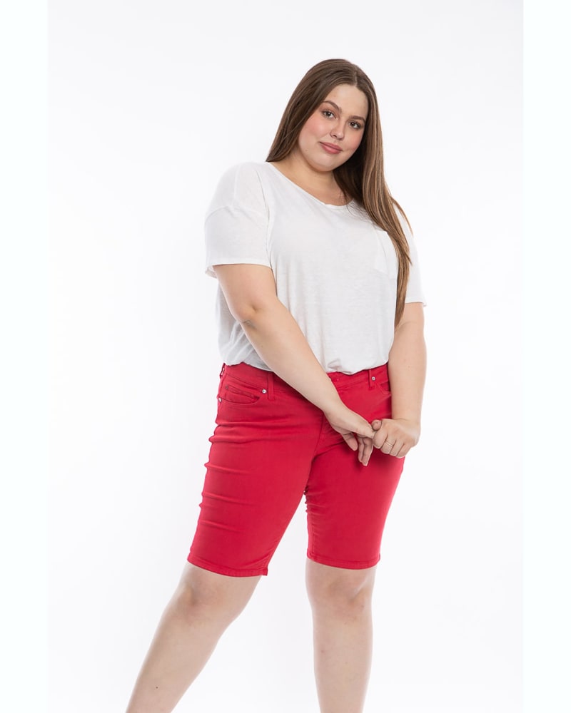 Front of a model wearing a size 16 Mid Rise Bermuda - Rose Red in ROSE RED by Slink Jeans. | dia_product_style_image_id:311965